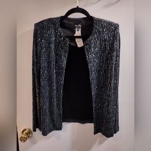 Dress jacket size Medium. Black glitter with a hint of blue